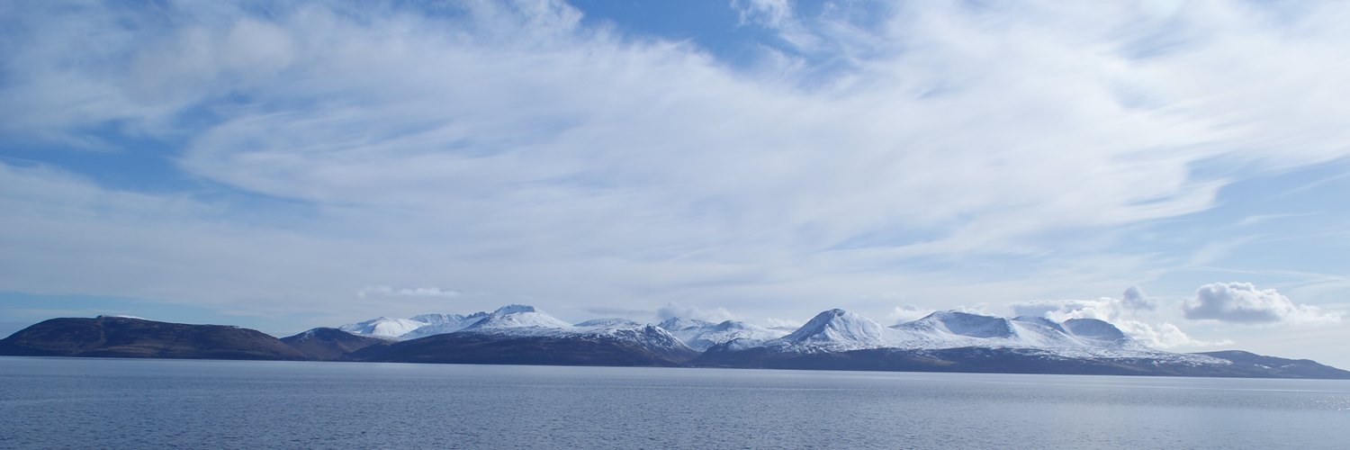 Snow capped mountains of Arran from Kintyre