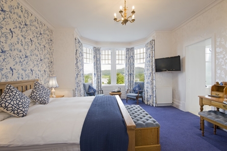 A superior bedroomat the Falls of Lora hotel