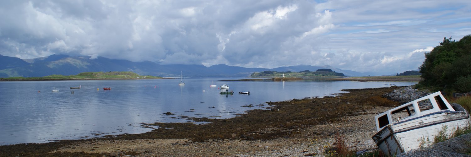 Beach with old boat at Appin